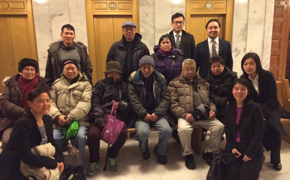 Mr Ng with neighbors and advocates